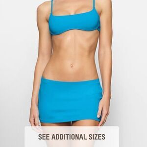 SKIMS NWT recycled swim skirt
